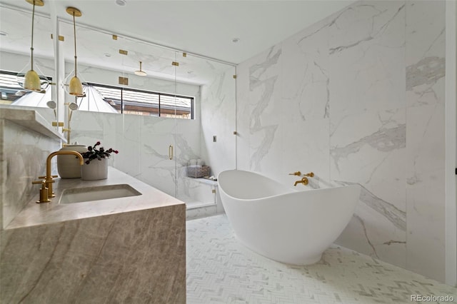 171 S Dexter St, Denver, CO 80246 - full bath with tile walls, a soaking tub, vanity, and a marble finish shower