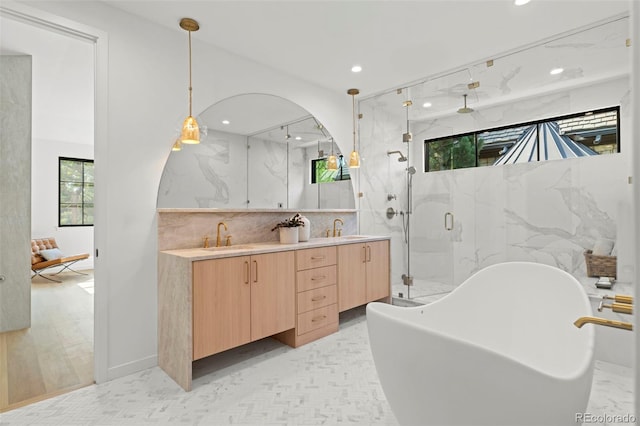 171 S Dexter St, Denver, CO 80246 - bathroom featuring a marble finish shower, recessed lighting, double vanity, and a freestanding bath