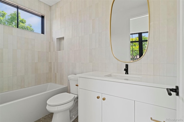 171 S Dexter St, Denver, CO 80246 - bathroom with tile walls, plenty of natural light, vanity, and shower / tub combination