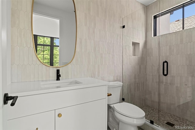 171 S Dexter St, Denver, CO 80246 - full bath with plenty of natural light, vanity, and a shower stall