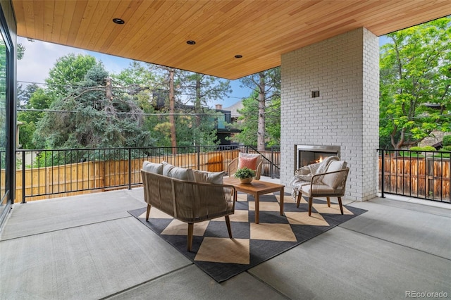 171 S Dexter St, Denver, CO 80246 - view of patio featuring an outdoor living space with a fireplace