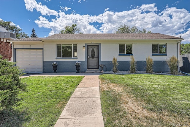 ranch-style house with a garage and a front lawn