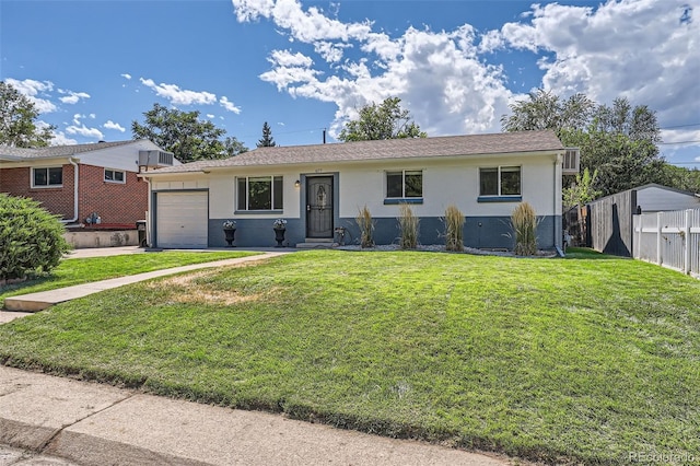 ranch-style home featuring a garage and a front yard