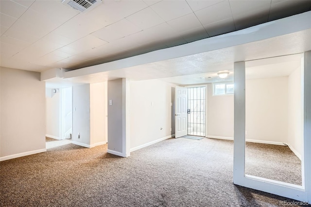 basement with carpet flooring