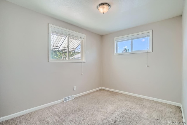 view of carpeted spare room