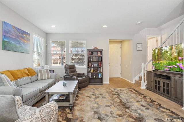 3178 Geneva Ct, Denver, CO 80238 - living area with stairway, wood finished floors, recessed lighting, and baseboards
