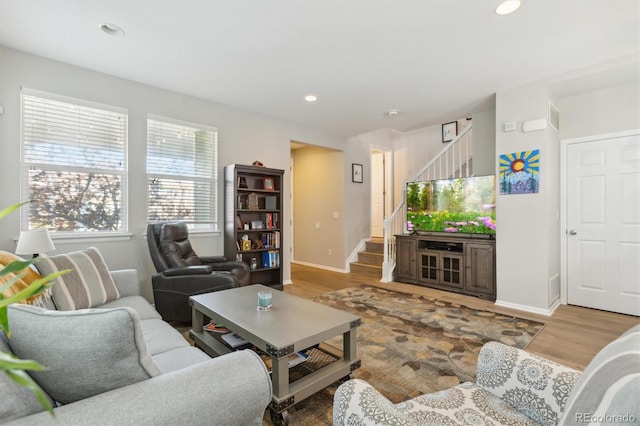 3178 Geneva Ct, Denver, CO 80238 - living room with stairs, baseboards, wood finished floors, and recessed lighting