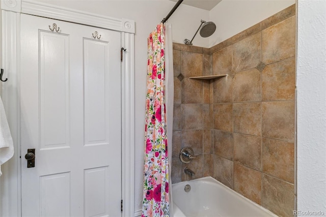 full bathroom with shower / tub combo