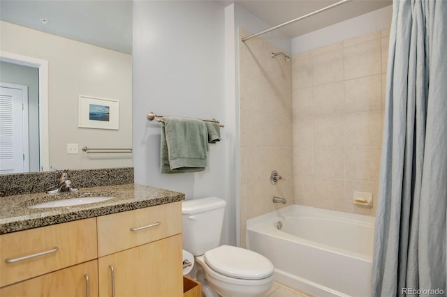 bathroom featuring toilet, shower / bath combination with curtain, and vanity