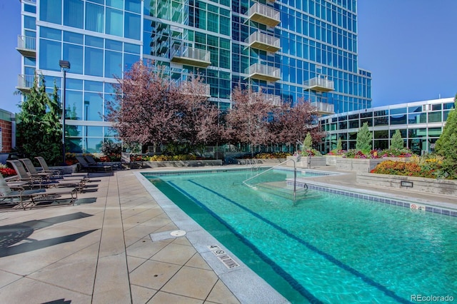 pool featuring a patio