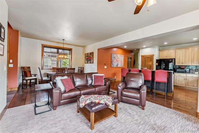 200 Rachel Ln, Breckenridge, CO 80424 - living area featuring wood-type flooring, recessed lighting, a ceiling fan, and a chandelier