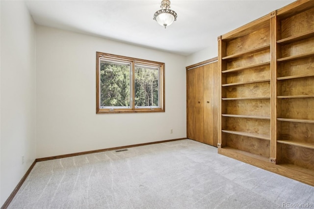 10469 Christopher Dr, Conifer, CO 80433 - unfurnished bedroom with carpet floors, baseboards, and a closet