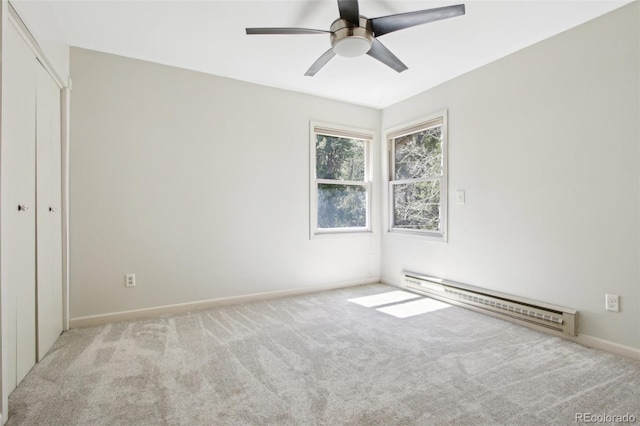 10469 Christopher Dr, Conifer, CO 80433 - unfurnished bedroom with baseboard heating, carpet, baseboards, and a closet
