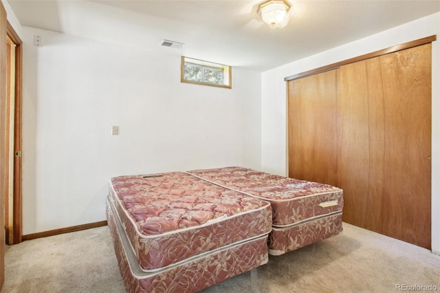 10469 Christopher Dr, Conifer, CO 80433 - bedroom with light colored carpet and a closet