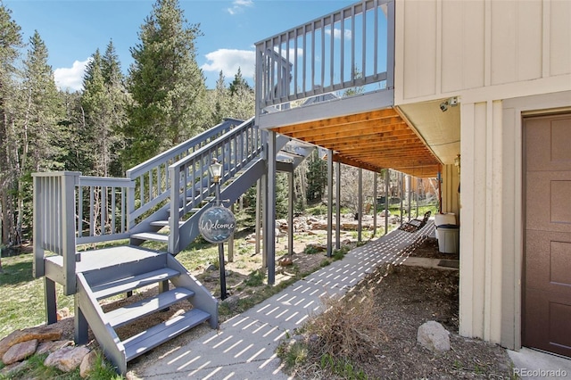 10469 Christopher Dr, Conifer, CO 80433 - view of property's community featuring stairs and a wooden deck