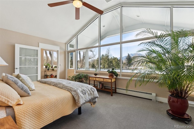 carpeted bedroom with a baseboard radiator and vaulted ceiling