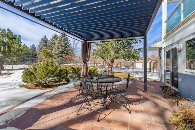 view of patio / terrace featuring a garage