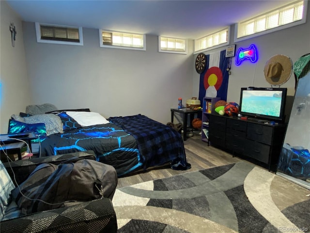 bedroom featuring hardwood / wood-style flooring