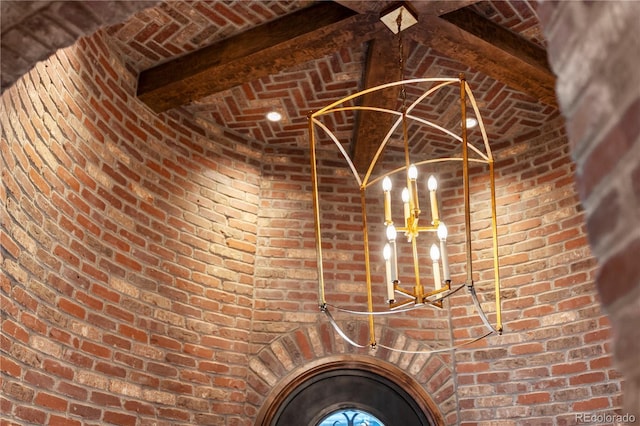 detailed view of brick wall and a chandelier