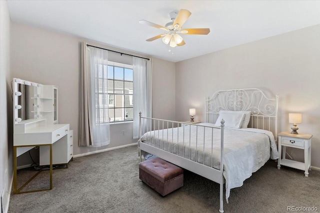 bedroom featuring ceiling fan, baseboards, and carpet