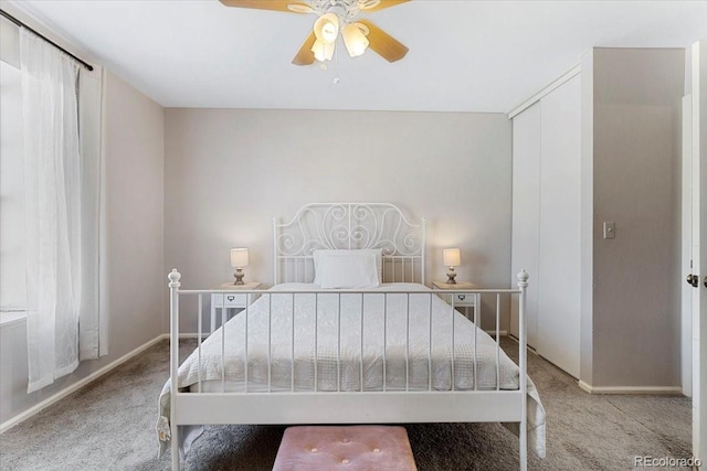 bedroom featuring baseboards, carpet floors, and ceiling fan