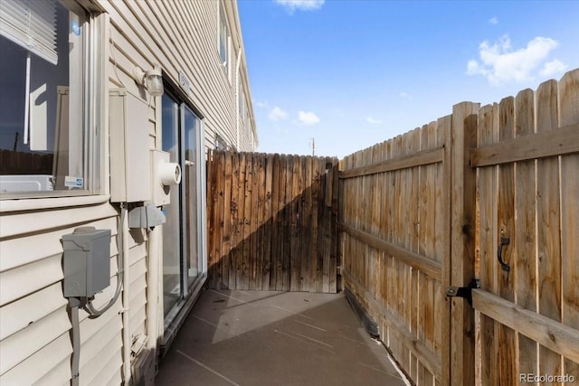 view of property exterior featuring fence