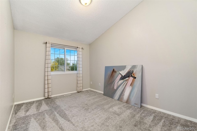 2954 E 101st Ave, Thornton, CO 80229 - spare room with carpet floors, a textured ceiling, and baseboards