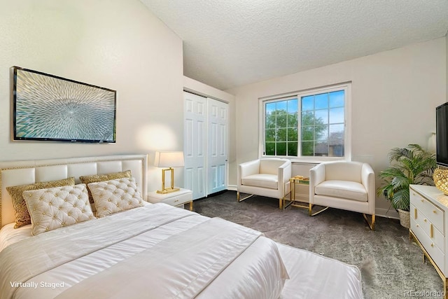 2954 E 101st Ave, Thornton, CO 80229 - carpeted bedroom featuring lofted ceiling, a closet, a textured ceiling, and baseboards