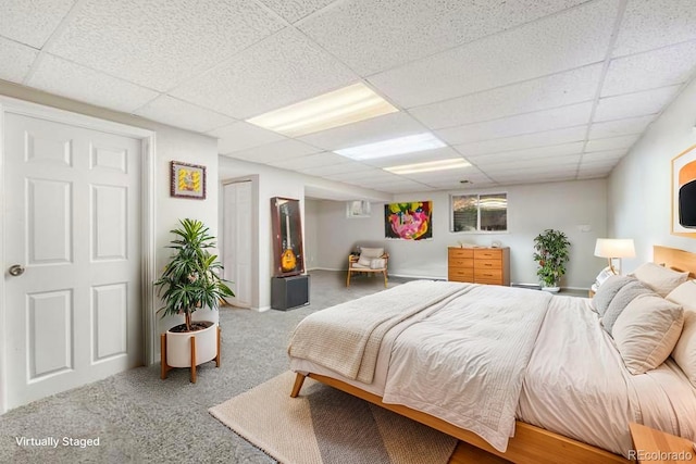 2954 E 101st Ave, Thornton, CO 80229 - bedroom featuring a paneled ceiling and carpet floors