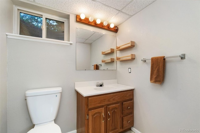 2954 E 101st Ave, Thornton, CO 80229 - half bath with toilet, vanity, and a paneled ceiling