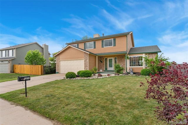 2954 E 101st Ave, Thornton, CO 80229 - traditional-style home with driveway, an attached garage, and a porch