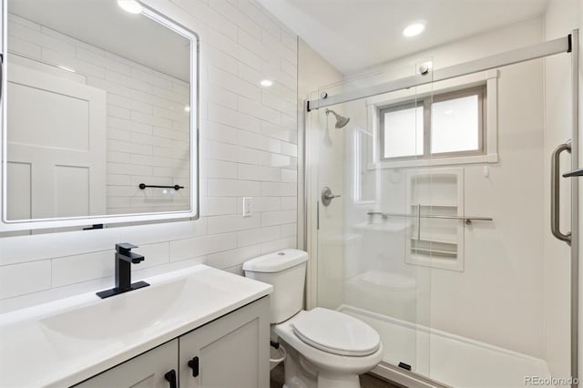 2840 Cottonwood Dr, Denver, CO 80221 - full bath with a shower stall, tile walls, tasteful backsplash, and toilet