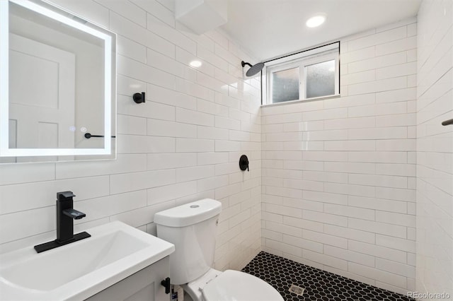 2840 Cottonwood Dr, Denver, CO 80221 - full bathroom with vanity, toilet, tiled shower, and recessed lighting