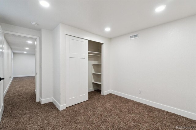 2840 Cottonwood Dr, Denver, CO 80221 - unfurnished bedroom featuring a closet, recessed lighting, carpet, baseboards, and visible vents