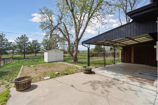 2840 Cottonwood Dr, Denver, CO 80221 - exterior space featuring an outdoor structure, a shed, and fence