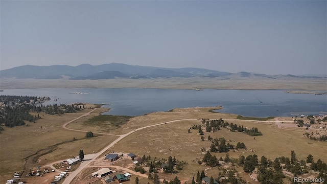 aerial view with a water and mountain view