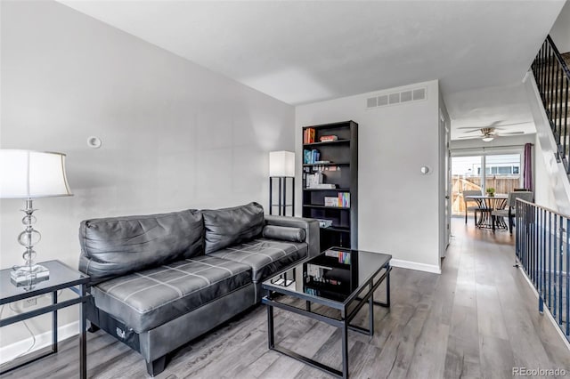 8905 Field St Unit 91, Westminster, CO 80021 - living area with wood finished floors, ceiling fan, and baseboards