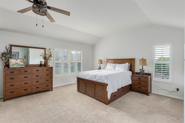 bedroom featuring lofted ceiling, light carpet, and ceiling fan