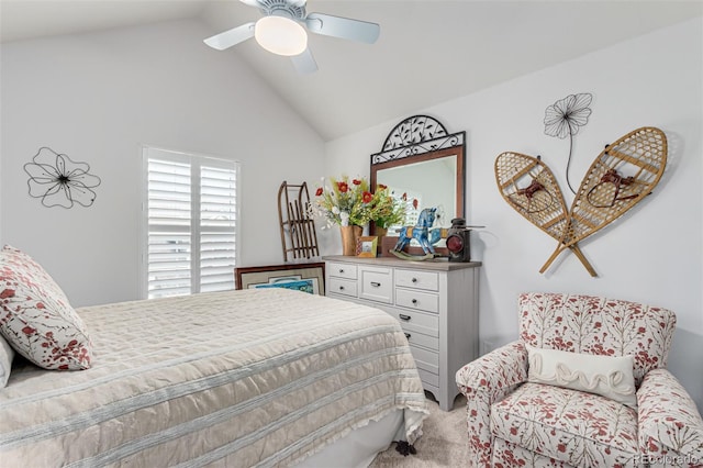 carpeted bedroom featuring ceiling fan and vaulted ceiling