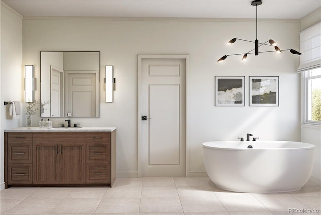 2778 Utica St, Denver, CO 80212 - bathroom featuring a freestanding tub, vanity, a chandelier, and tile patterned flooring