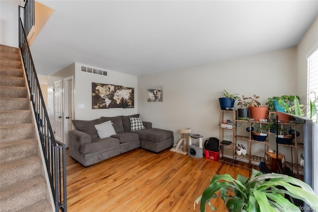 living room with wood-type flooring