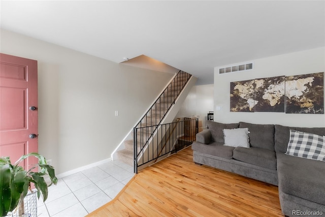 living room with light tile patterned floors