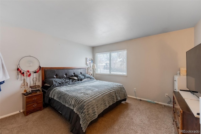 bedroom with light carpet