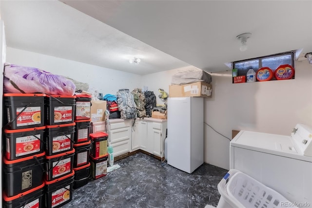 laundry area with independent washer and dryer