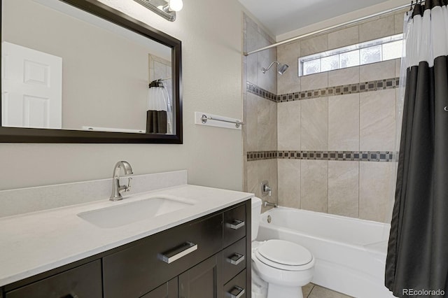 full bathroom with toilet, vanity, and shower / bath combo