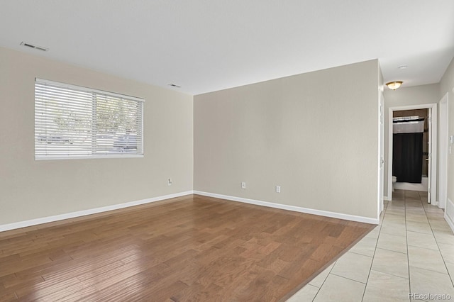 view of tiled spare room