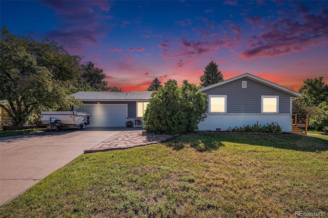 7780 S Kendall Blvd, Littleton, CO 80128 - single story home with an attached garage, a front lawn, concrete driveway, and brick siding