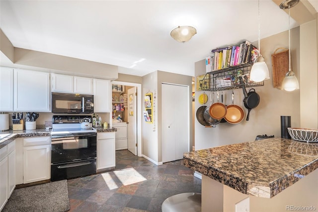 7780 S Kendall Blvd, Littleton, CO 80128 - kitchen featuring black appliances, dark stone finish flooring, white cabinets, dark countertops, and separate washer and dryer