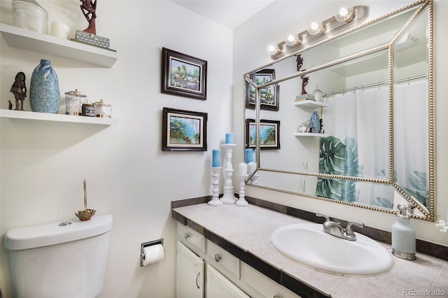 7780 S Kendall Blvd, Littleton, CO 80128 - bathroom with vanity and toilet