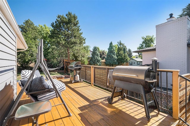 7780 S Kendall Blvd, Littleton, CO 80128 - wooden deck featuring a grill
